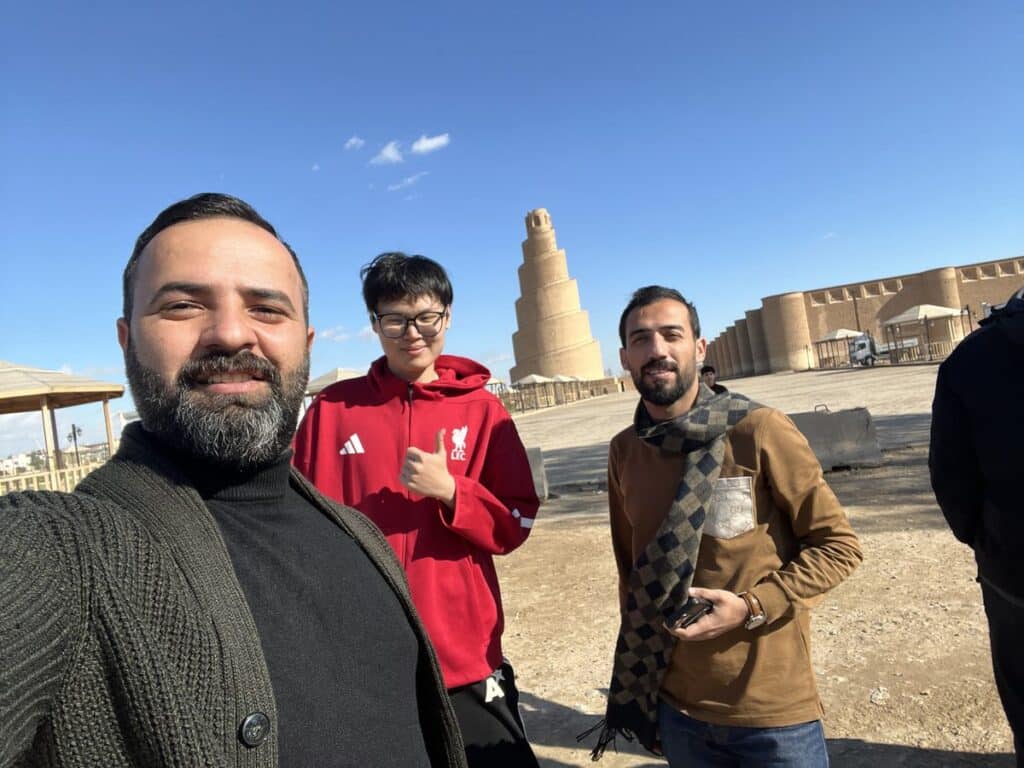 Ali with international guests at the Spiral Minaret of Samarra Iraq