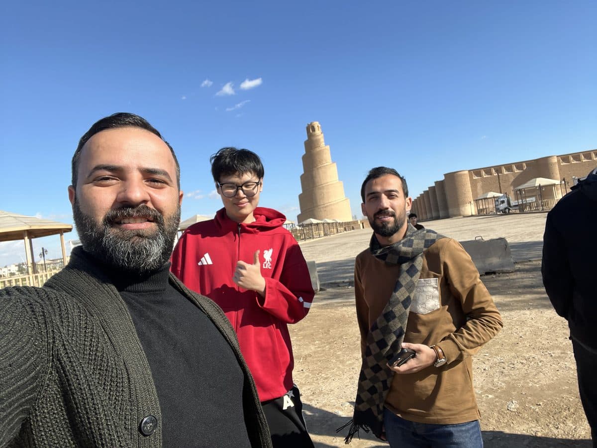 Ali with international guests at the Spiral Minaret of Samarra Iraq