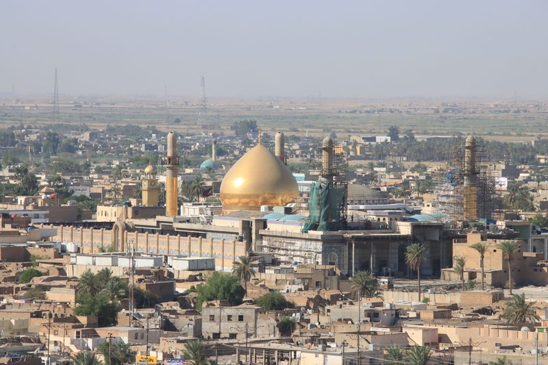 Aerial view of the golden dome of the Imam Ali al-Hadi shrine rising above the city of Samarra, Iraq