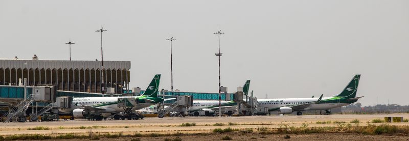 Iraqi Airways aircraft lined up on the tarmac at Baghdad International Airport, Iraq