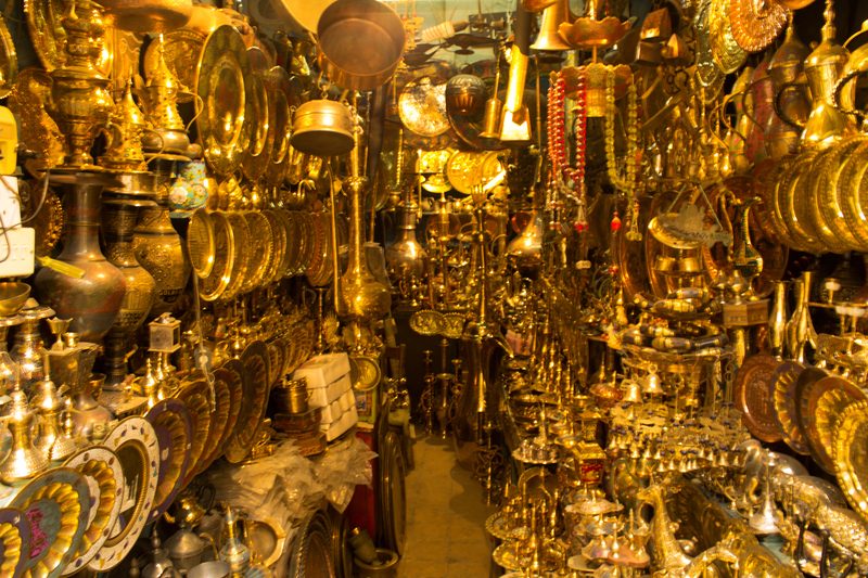 Traditional Iraqi shop packed with copper and brass handicrafts and ornaments in Najaf, Iraq